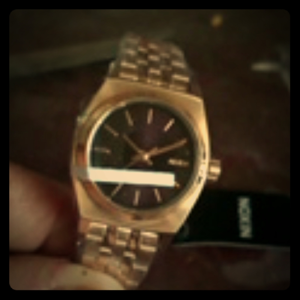 Nixon ladies rose gold watch